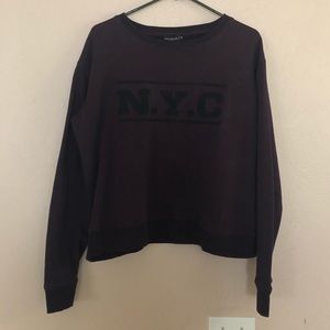 Burgundy NYC logo sweatshirt.